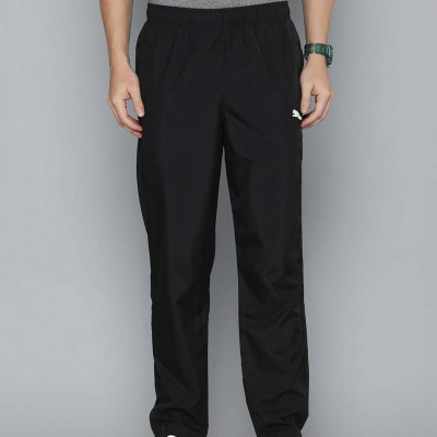 PUMA Men Black Brand Logo Printed Woven Track Pants